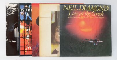 A collection of five vinyl LPs to include artists such as Faces, Neil Diamond & Meat Loaf (5)