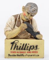 An early 20th century cobbler advertising display for 'Phillips Stick A Soles And Heels', the