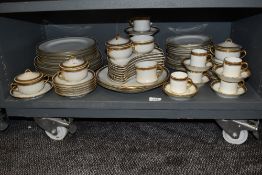 A good quantity of vintage Cauldon china, having white ground with gilt banding and Greek key