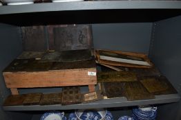 An assortment of antique metal printing blocks, including Punch style scenes, Manchester interest