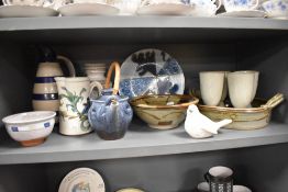 A mixed lot of studio pottery, amongst which are bowls, jugs, vases and goblets.