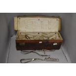 A collection of vintage medical apparatus including forceps.