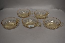 A set of five Art Deco era Daum Nancy peach crystal glass cocktail or punch glasses.