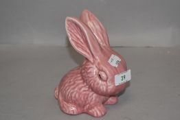 A Sylvac style rabbit in pale pink.