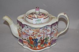 An 18th century English porcelain teapot, possibly Newhall, in the commode shape with Chinoiserie
