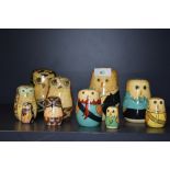 A set of ten hand painted nesting owls.