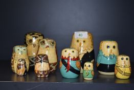 A set of ten hand painted nesting owls.