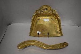 A brass Edwardian style crumb tray and brush.