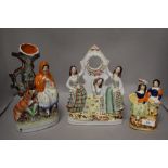 Three Staffordshire flat back figurines, to include little red riding hood and three ladies in