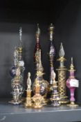 A collection of fine Eygyptian glass perfume bottles including smaller examples, coloured glass