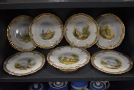 Six 19th century Dessert wares and a tazza, having romanticised hand painted scenes of landscapes,