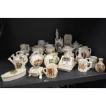 A large collection of crested wares including interest to Blackpool, Hexham, Isle of man and much