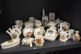 A large collection of crested wares including interest to Blackpool, Hexham, Isle of man and much
