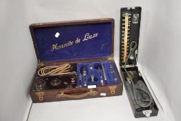 An antique cased high frequency violet ray apparatus with glass components, as used by Chrisholm