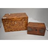 An antique tea caddy having two internal compartments and a larger highly figured box of Hungarian