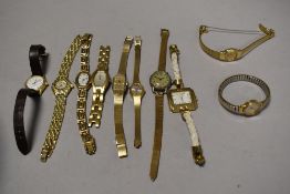 10 wrist watches all in gold tones.
