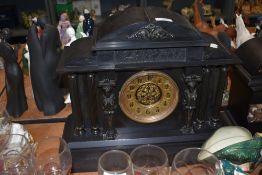 A pre 1900 Victorian slate mantel clock, classical style monument design with Greek columns and a