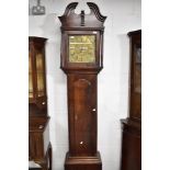 An 18th Century oak longcased clock having 30hr movement and brass dial named for Lomax Blackburn