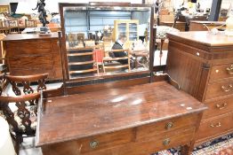 An early 20th Century mahogany dressing table by Waring & Gillows , with Gillows Lancaster and Pauls
