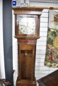 A 19th Century oak and mahogany long cased clock havimg 30 hour movement and painted dial marked M
