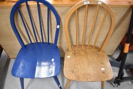 Two vintage Ercol hoop and stick back kitchen chairs, one having been over painted in blue
