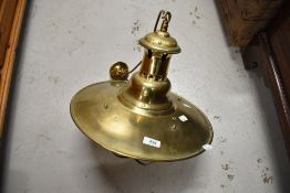 A vintage style brass ceiling light fitting