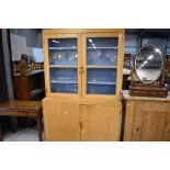 A utility unit, display cabinet over double cupboard, would make a great kitchen cabinet