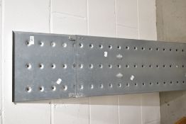 Two pieces of aluminium shelving or lightweight ramp