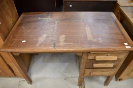 An early 20th Century oak office desk, width approx. 105cm
