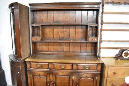 A traditional Titchmarsh and Goodwin oak dresser , width approx 138cm
