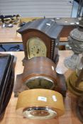 Three clocks including a bracket clock AF, an oak cased clock presented to the Farmers Finance