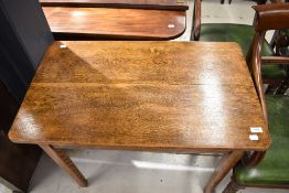 A 19th Century oak side table having drawer to end, on square tapered legs, approx. 82 x 48cm