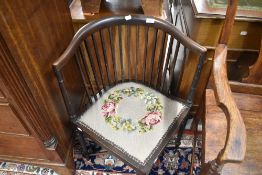 An Edwardian mahogany corner bedroom chair