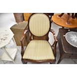 A Victorian mahogany spoonback carver chair