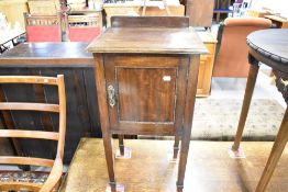 An early 20TH Century mahogany bedside cabinet, by Waring & Gillows, with Lancaster label