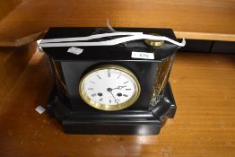 A Victorian marble mantel clock