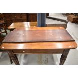 A 19th Century mahogany extending dining table in the Gillows style