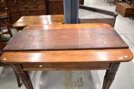 A 19th Century mahogany extending dining table in the Gillows style