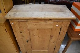 A natural pine cabinet, width approx. 91cm