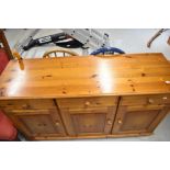 A vintage yellow pine sideboard base, width approx. 138cm