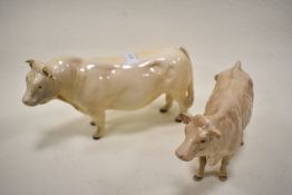 A Beswick figure study of a Charolais Bull 2463A and Cow 3075A