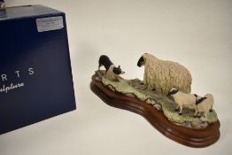 A Border Fine Arts figure study titled ' Black Faced Ewe and Collie ' no. 104 with box but no