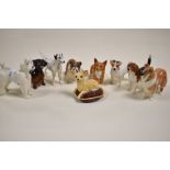 A pack of nine small Beswick dog figure studies including Bulldog, Jack Russell, Corgi, Dalmation,