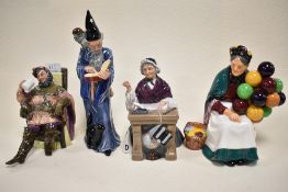 Four Royal Doulton figure studies including The Foaming Quart HN2162, The Wizard HN2877, The Old