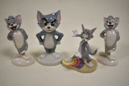 Four Tom cat figure studies including Wade, Wedgwood and two John Beswick