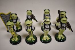 A set of eight Lorna Bailey frog figure studies from the marching band series