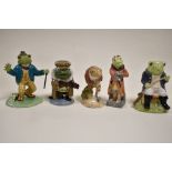 Five cartoon character toad and frog figures including Royal Albert ' Jeremy Fisher ', Royal Doulton