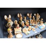 A selection of Pendelfin bunny rabbit figure studies approximately twenty small figures and four