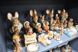 A selection of Pendelfin bunny rabbit figure studies approximately twenty small figures and four