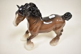 A large Beswick cantering shire horse